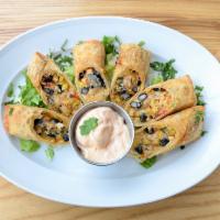 Tex-Mex Egg Roll · Filled with chicken, black beans, corn, peppers, onion and cheese. Served with a chili mayo.