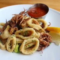 Calamari · Fried and served with spicy marinara sauce or grilled and served with garlic-white wine sauce.