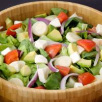 The Abigail Salad · Crisp lettuce, fresh mozzarella, avocado, tomato, hearts of palm, red onions and fresh basil...