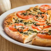 4 Cheese Gourmet Pizza · Fontina, mozzarella, Gouda and Parmesan cheese topped with fresh basil and tomatoes over oli...