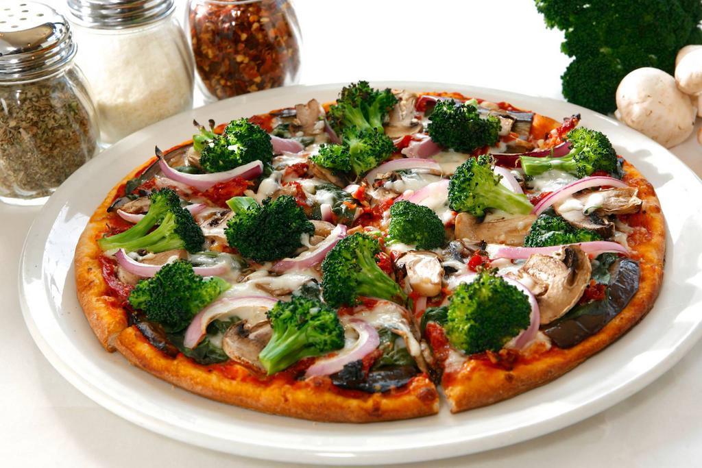 Veggie Twist Gourmet Pizza · Broccoli, grilled eggplant, onions, mushrooms, sun-dried tomato, fresh spinach, and mozzarella cheese over fresh tomato sauce.