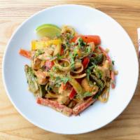 Tequila Lime Chicken · Fettuccine sauteed with chicken, tri-color peppers, red onions, and cilantro in tequila-lime...