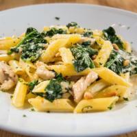 Popeye Penne · Penne sauteed with chicken, shallots, pine nuts and spinach in Parmesan basil cream sauce.