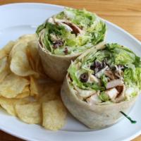 Chicken Caesar Wrap · Diced chicken, lettuce, Kalamata olives, shredded Parmesan cheese and Caesar dressing in a f...