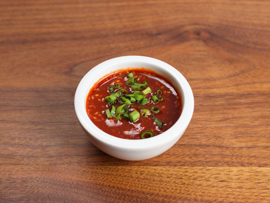 Gochujang Sauce (2 oz) · Sweet and spicy Korean gochujang glaze. Contains sesame and soy. We cannot make substitutions.