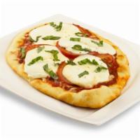 Fresh Mozzarella & Tomato · Sliced tomatoes, fresh mozzarella slices, pizza sauce and fresh basil chiffonade Cal. 820. V...