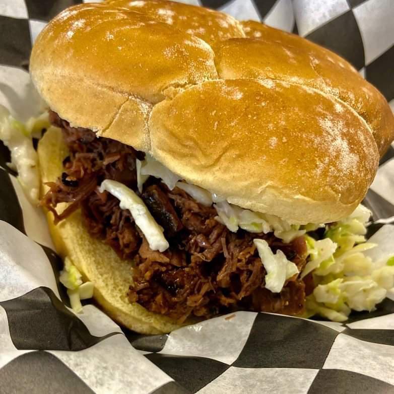 Pork Sammich Family Meal · 4 pork sandwiches, topped with slaw and choice of signature BBQ sauce with choice of 2 large sides.