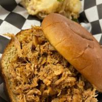 Chopped Pork Sammich Meal · Smoked pork shoulder, chopped and served on a toasted bun with slaw and choice of signature ...