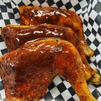 Chicken Quarter · Thigh and leg. Smoked chicken quarter glazed with our signature House BBQ Sauce.
