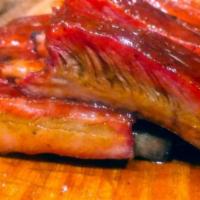 Rib Family Meal · Rack of ribs and choice of 2 large sides.