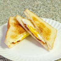 Egg with Cheese Sandwich Breakfast · Served on white toast, Wheat Toast, English muffin or bagel. Everything Bagel, Sesame Bagel