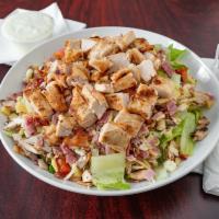 Chopped Salad · Diced chicken, chopped iceberg and romaine lettuce, Canadian bacon, salami, bacon, mushroom,...