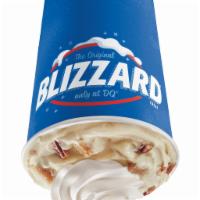 Pecan Pie Blizzard Treat · Brown sugar pie pieces, pecans and caramel topping blended with our world-famous soft serve ...