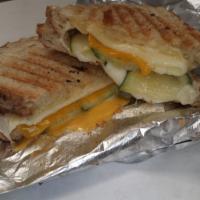 Grilled Cheese Trio Sandwich · Your choice of three cheeses grilled to perfection.
