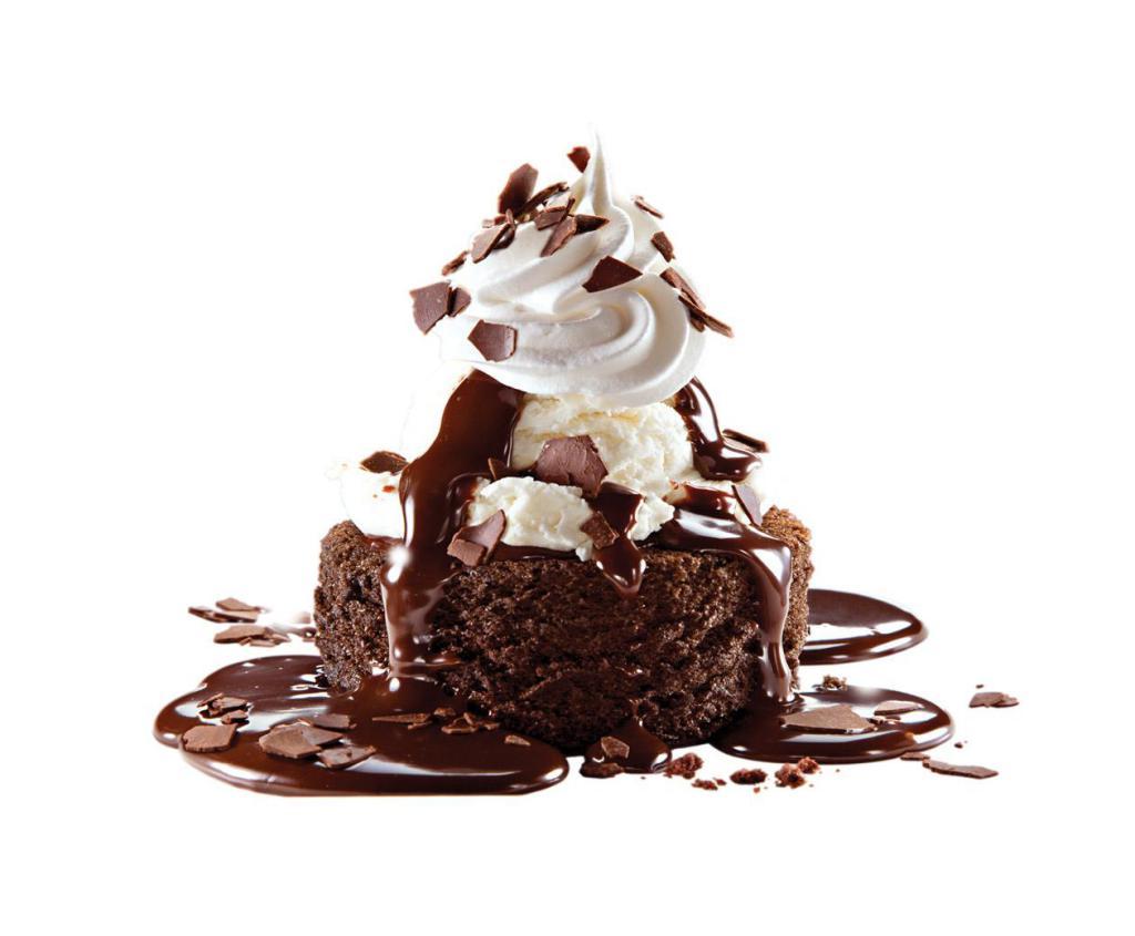 Chocolate Lava Meltdown · Warm chocolate cake, French vanilla ice cream, whipped topping and shaved chocolate.