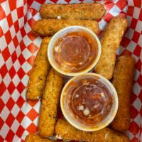 Mozzarella Sticks · Eight (8) mozzarella sticks, served with marinara sauce.