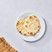 Naan (V) by dosa by DOSA · By dosa by DOSA. Indian flatbread, cooked tandoori style...the perfect companion to every cu...