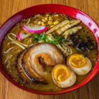 Miso Ramen · Ramen noodle top with charsu pork slice, seasoned soft boiled egg, fish cake, bamboo shoot, ...