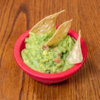 Guacamole · Fresh smashed avocado mixed with tomatoes, onions and cilantro.