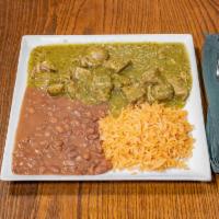 Chile Verde · Tender marinated pork, smothered with green tomatillo sauce. Choice of corn or flour tortill...