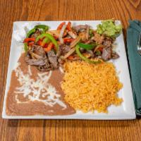 Fajitas with 2 Meat Combo · Choice of carnitas, chicken, steak or shrimp. Served with grilled peppers and onions, as wel...