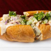 The Diggins Sandwich · Salida del Sol Mexican Amber. Torpedo roll, pulled pork, Firetruck BBQ sauce, coleslaw, roas...
