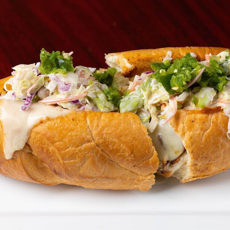 The Diggins Sandwich · Salida del Sol Mexican Amber. Torpedo roll, pulled pork, Firetruck BBQ sauce, coleslaw, roasted jalapenos and provolone cheese.