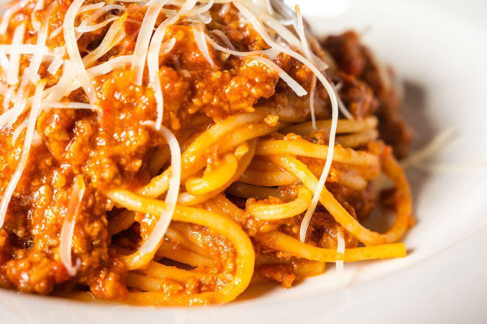 Spaghetti Alla Bolognese · Spaghetti with bolognese sauce (A slow-cooked ground beef in a rich tomato sauce and fresh herbs).