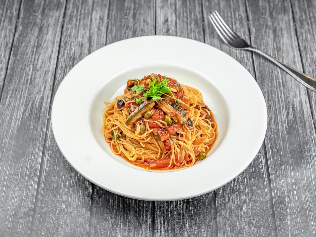 Cappellini Alla Puttanesca · Cappellini with puttanesca sauce (A combination of anchovies, capers, kalamata olives, onion, garlic red wine, tomato sauce)