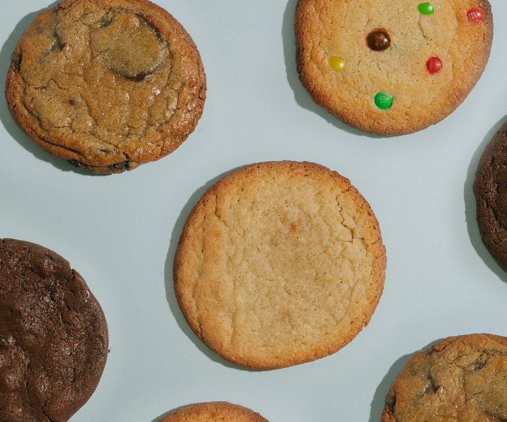 A Dozen Cookies + 1 · We will send you 4 Chocolate Chip, 3 Snickerdoodle, 3 M+M’s, 3 Vegan Double Chocolate