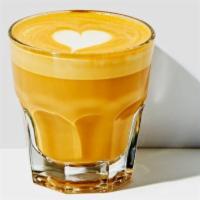 Cortado · Our creamy and flavorful espresso combined with 2 ounces of steamed milk and a very thin lay...