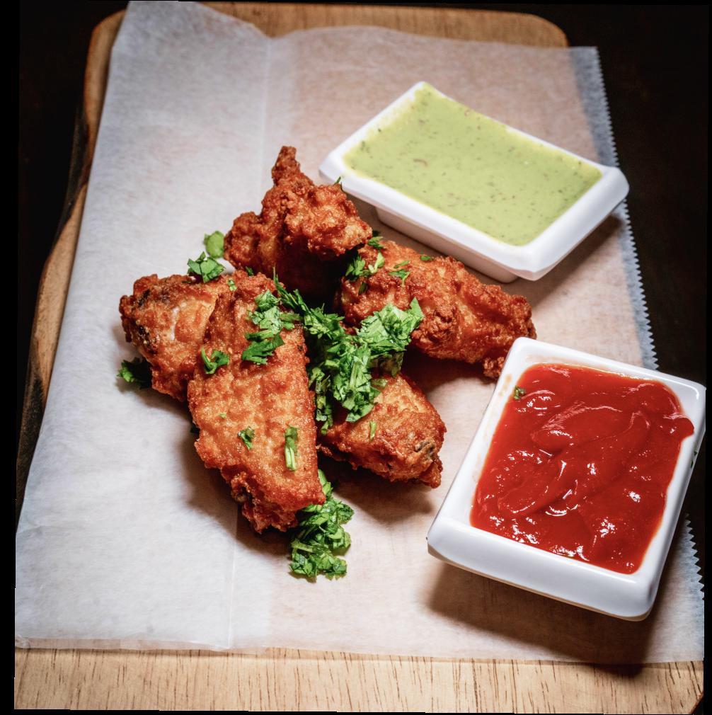 Chicken Wings(5) with fries · Get a serving of three fresh, crispy, golden brown chicken wings fried then tossed in your choice of sauce with side of fries 
All our products are halal.