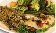 Sante Fe Chicken · A succulent grilled chicken breast topped with grilled peppers and onions and smothered with...