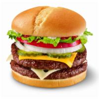 1/2 lb. Cheese GrillBurger · Two 1/4 lb. 100% beef burger topped with melted cheese, thick-cut tomato, crisp chopped lett...