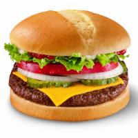 1/2# Cheese Grill Burger · Two 1/4 lb. 100% beef burger topped with melted cheese, thick-cut tomato, crisp chopped lett...