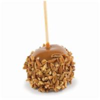 Pecan Caramel Apple · Kilwins pecan caramel apple is a crisp granny Smith apple dunked in our hand-crafted copper-...