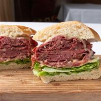 NY Style Sandwich · 1/2 lb. hot pastrami with mayo, lettuce, tomato, onion, 1000 Island and provolone on sour ro...