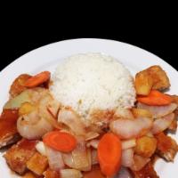Sweet and sour fried fish over rice · 