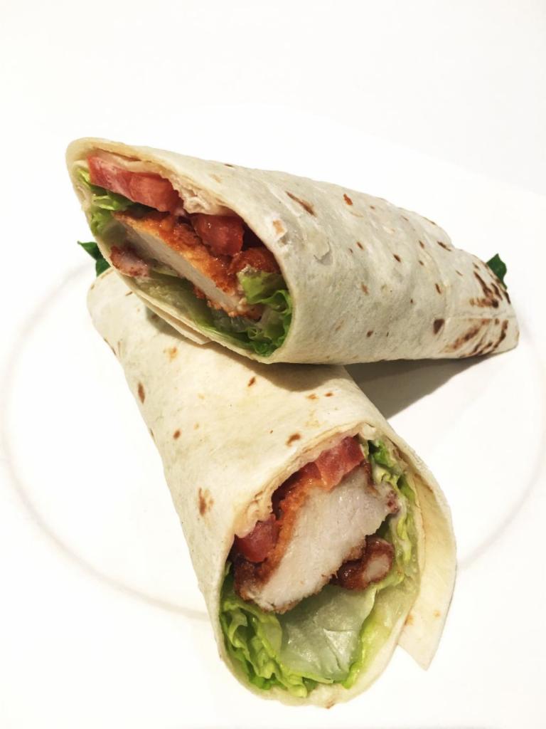 Chicken Steak Wrap · Fried chicken steak, tomato, romaine lettuce, and ranch dressing wrapped in tortilla