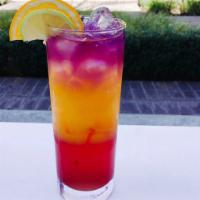 Tropical Sunset 16 oz · Fresh lime, fresh orange juice, raspberry juice, strawberry juice and butterfly pea flower tea