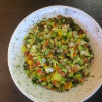 Lebanese Salad · Chopped lettuce, tomato, cucumber, radish, bell pepper, scallions, fresh mint and lemon oil ...