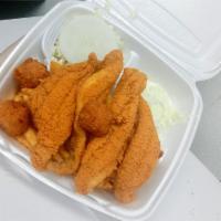 Catfish Basket · Includes 4 fillet catfish, fries, hush puppies, coleslaw, tartar sauce, and sliced onion.