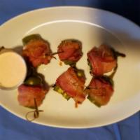 6 Grilled Bacon Jalapeno Poppers · Grilled bacon and jalapeno poppers grilled and smoked with cherry wood.
with a sour cream ch...