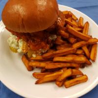 Fried Chicken Sandwich · Served with a monstrously towering sandwich. A huge juicy breast with a flaky crust is serve...
