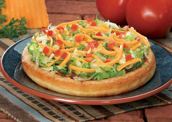 Taco Pie · Beef, onions, lettuce, tomatoes, taco sauce, cheddar cheese and mozzarella cheese.