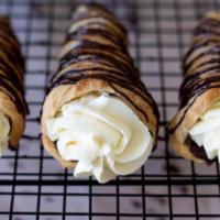 Cream Horn · Puff pastry filled with vanilla custard. (Similar to a cannoli.)