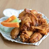 Bone-In Buffalo Wings · Served with bleu cheese or ranch with celery sticks and carrots.