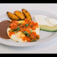 Huevos Rancheros · Eggs served sunny-side up with ranchera tomatoes sauce. Served with avocado, fried plantains...