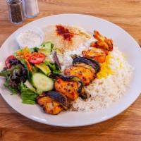 Chicken Kabob Plate · Grilled pieces of chicken breast marinated in lemon juice and saffron with bell peppers and ...