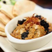 Eggplant Dip · Seasoned eggplant with caramelized onion, fried mint and a yogurt sauce topping. Served with...